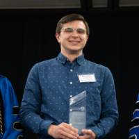 Student Niemeyer Award winner with President and Provost
